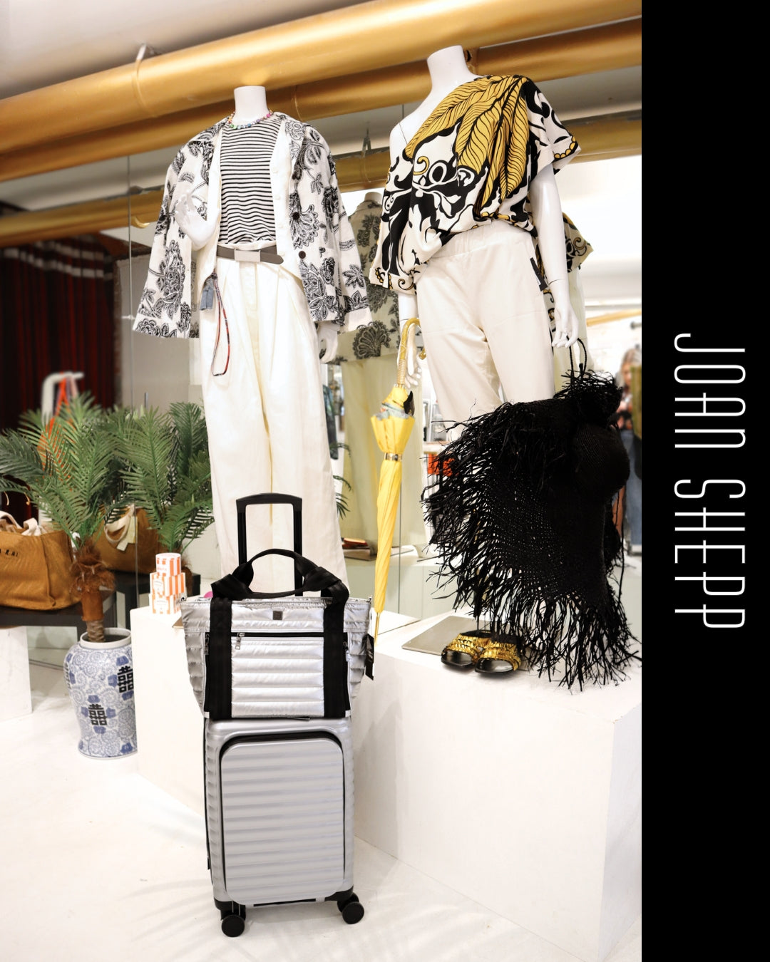 MANNEQUINS WEARING VACATION-READY CLOTHES IN-STORE, ALSO SHOWING TRAVEL BAGS AND ACCESSORIES