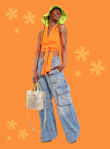 PRODUCTS FEATURED: NORMA KAMALI HALTER TOP, STELLA MCCARTNEY BUCKET HAT, ACNE STUDIOS JEANS, B. MAY BAG, RICK OWENS SHOES
