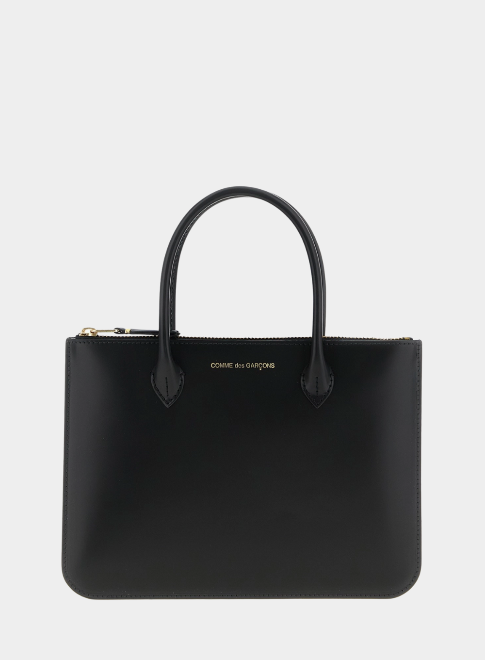 Black handbag with a visible brand name on a light gray background