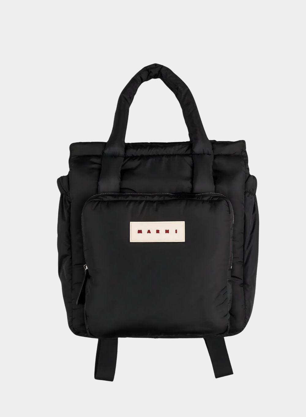 Black backpack with a visible brand logo on a light gray background