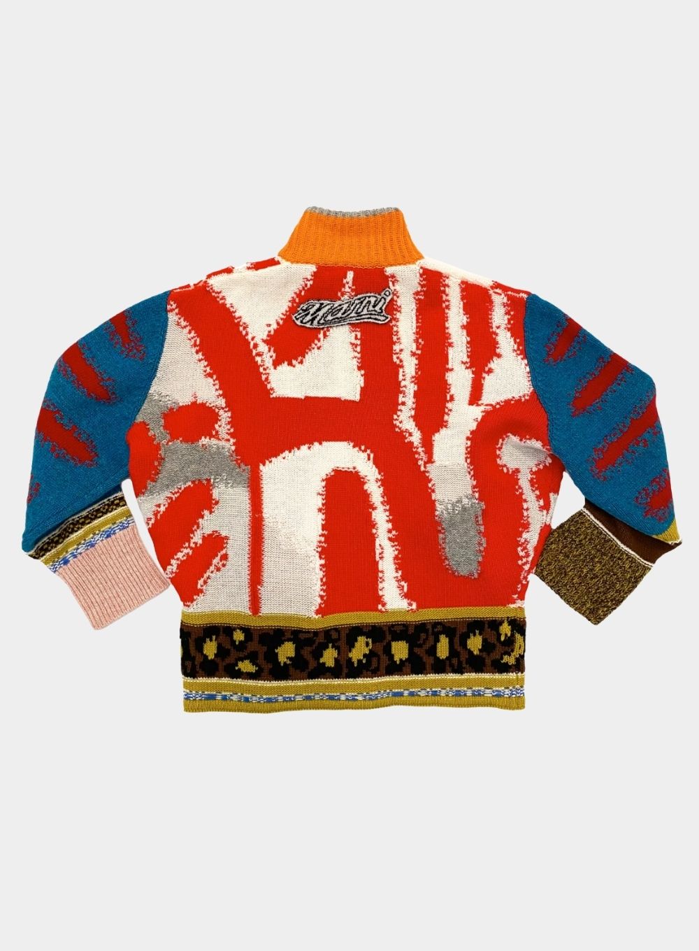 Colorful sweater with abstract patterns on a white background