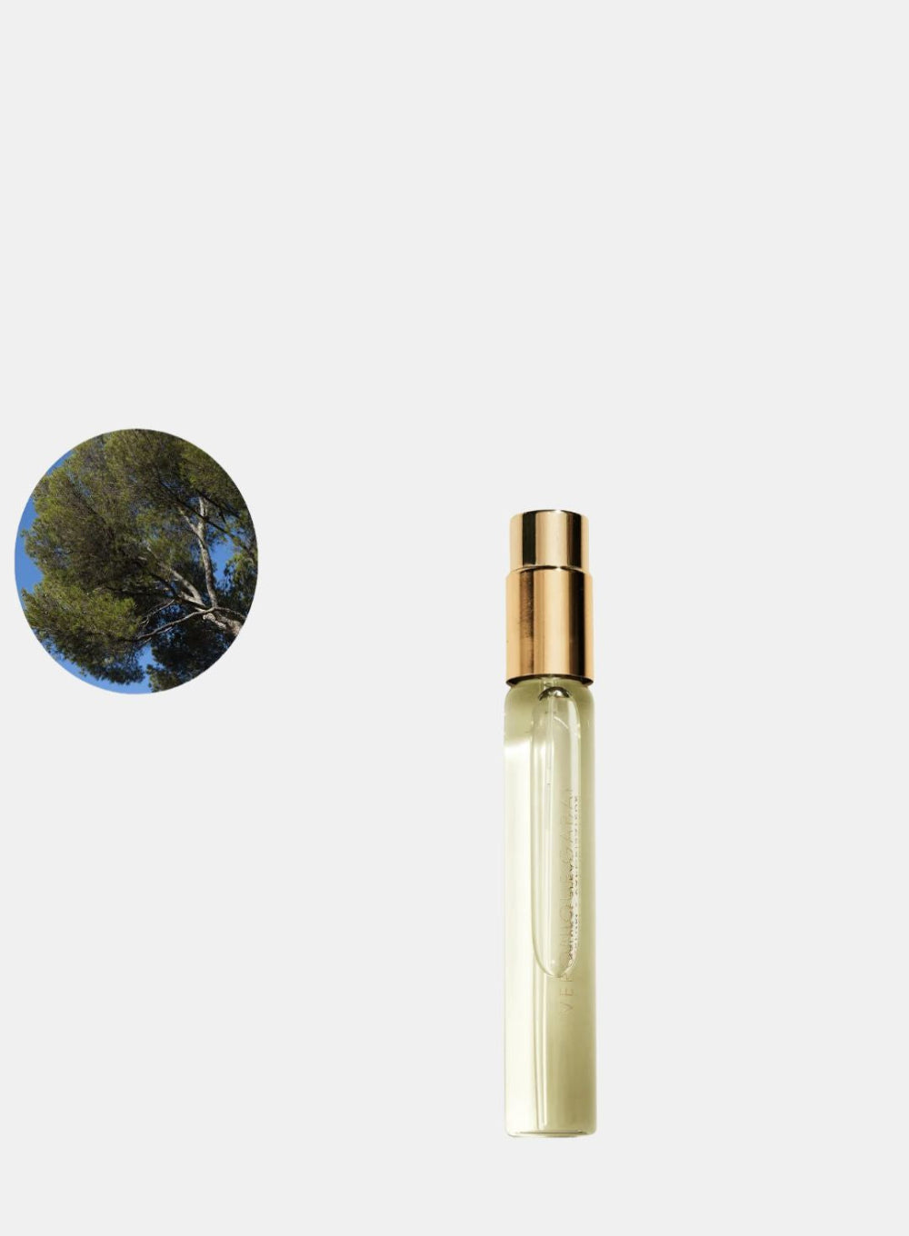 Small glass bottle with gold cap on a white background